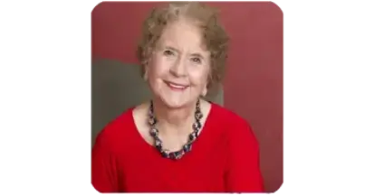 Senior woman smiling at home in a relaxed setting
